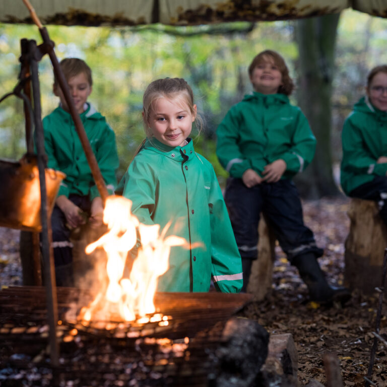 Students by a fire