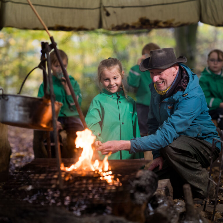 Students by a fire