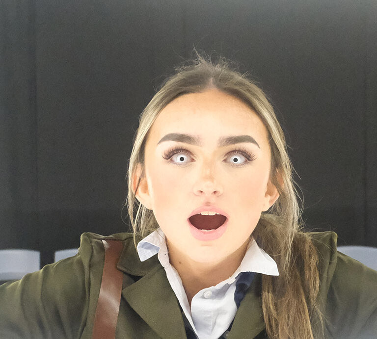 student with lenses in